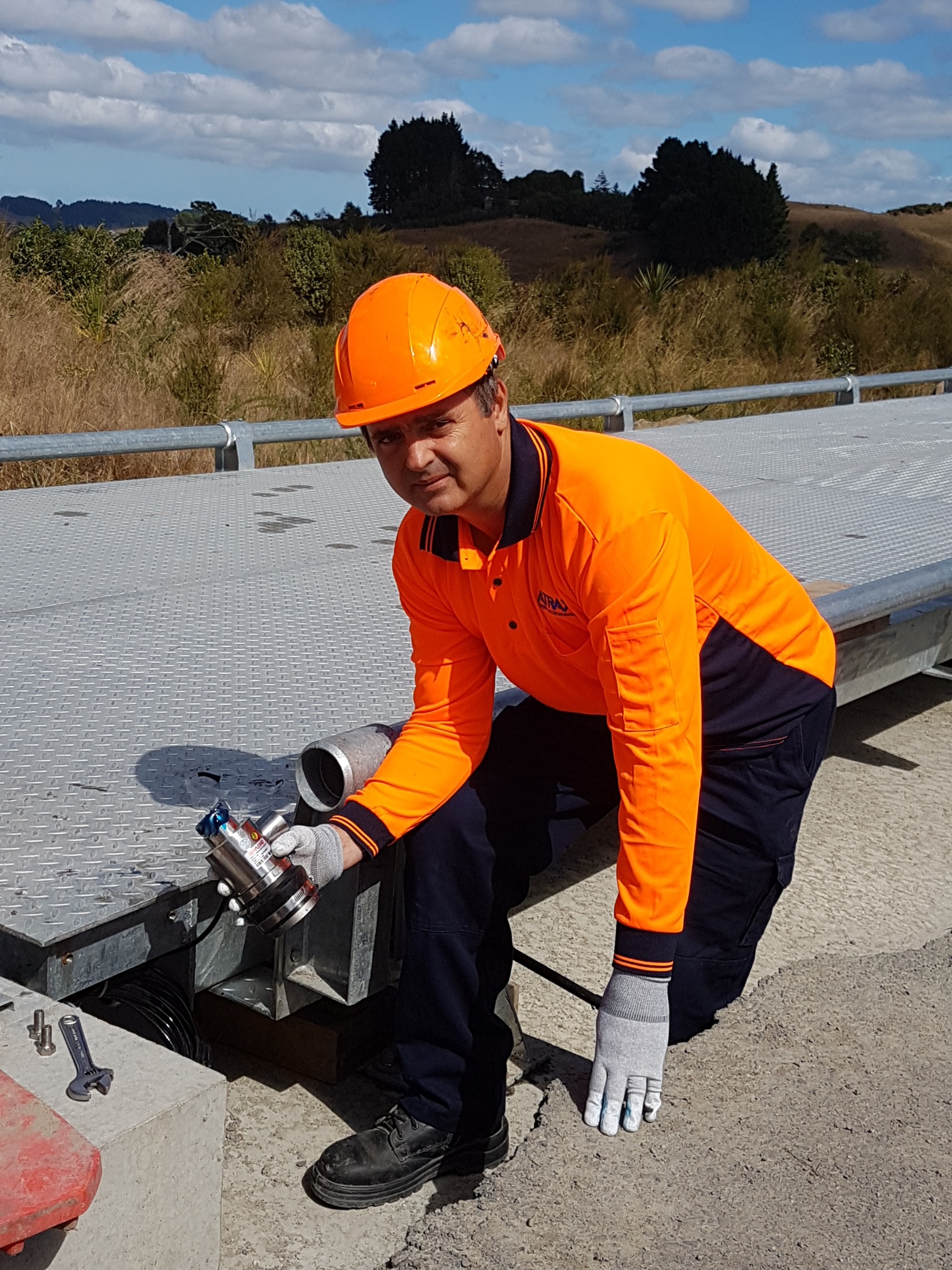 Andrew Thomson, Scale Technician, Atrax Group NZ, installing load cell